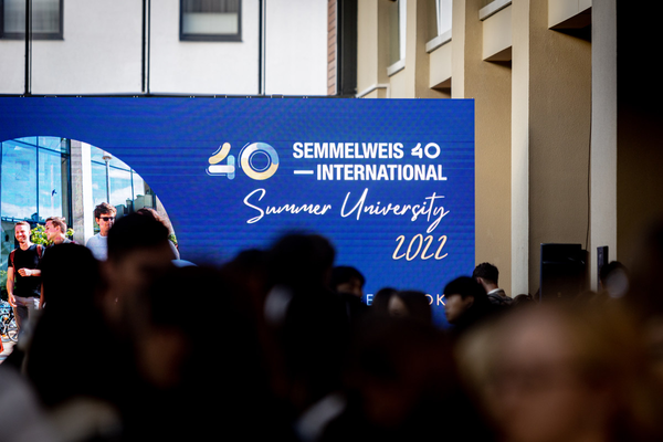 The photograph shows a sign for the "40 Semmelweis Summer University 2022"