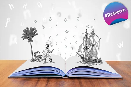 An open book with illustrations and letters floating around, symbolising the imaginative and adventurous nature of storytelling.