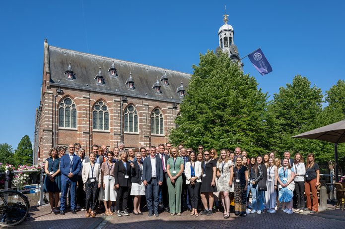 The picture shows the EUniWell representatives in front of Leiden University.